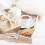 Romantic breakfast with coffee, cookies and gift box, birthday, wedding or valentines day concept, soft vintage tone